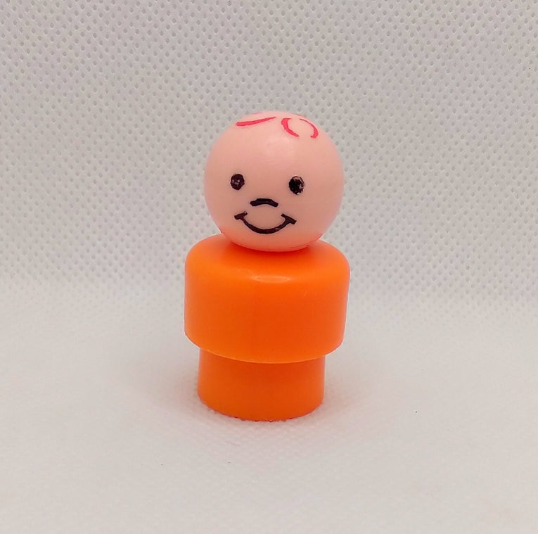 Orange body red stamped hair boy- All plastic